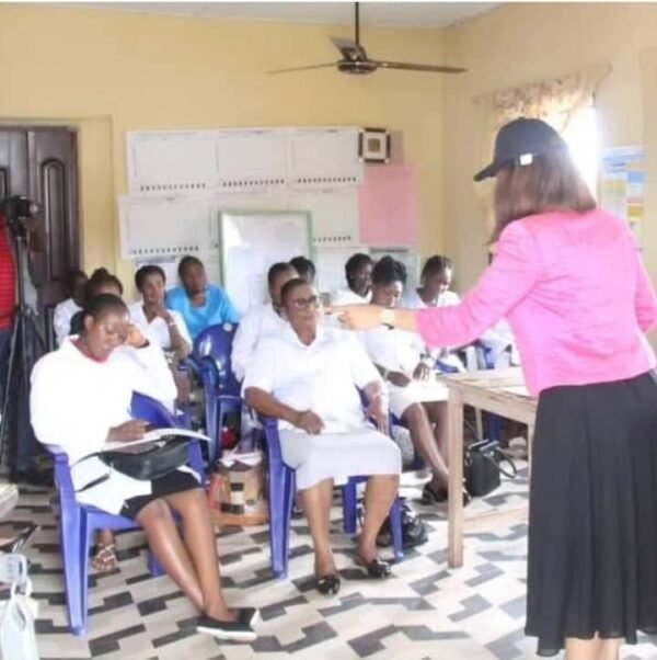 Dr. Idara teaching health workers
